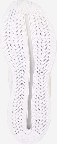 Baskets basses 'Zig Elusion Energy' Reebok en blanc