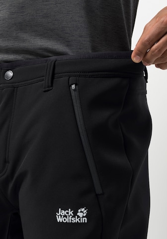 JACK WOLFSKIN Regular Workout Pants 'Zenon' in Black