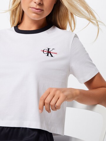 T-shirt ' Monogram Embroidery Ringer W ' Calvin Klein Jeans en blanc