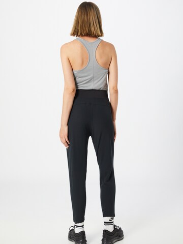 NIKE Slimfit Sporthose 'Bliss Victory' in Schwarz