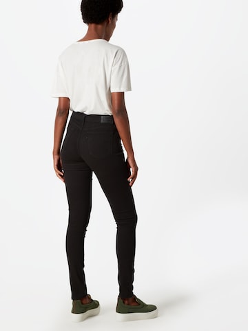 LEVI'S ® Skinny Farkut '711 Skinny' värissä musta