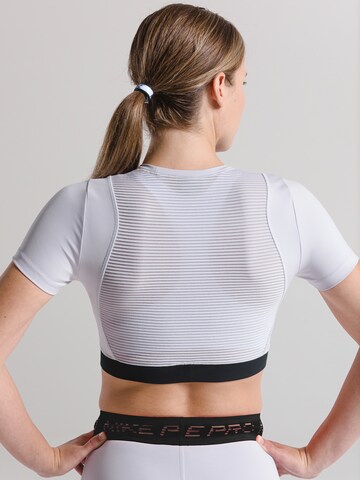 NIKE Functioneel shirt 'Aero' in Lila