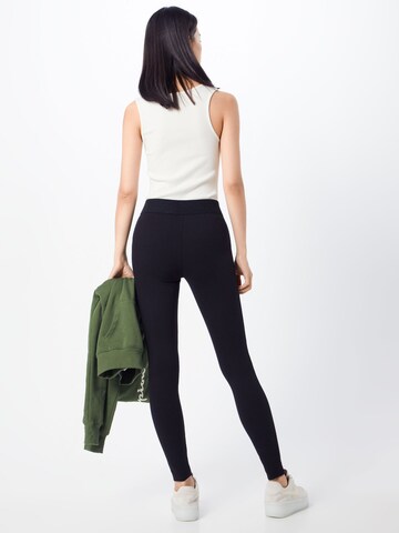 Skinny Leggings de la ONLY pe negru: spate