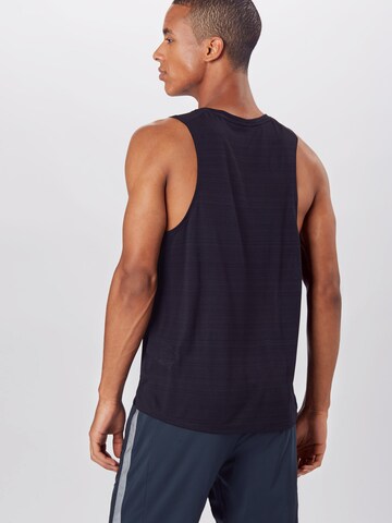 NIKE Regular fit Functioneel shirt 'Miler' in Zwart