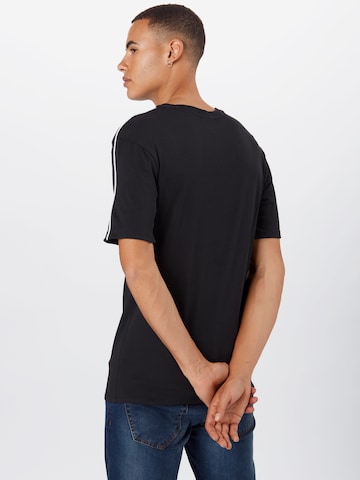 juoda Nike Sportswear Standartinis modelis Marškinėliai 'Repeat'