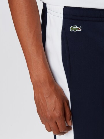 LACOSTE Tapered Bukser i blå