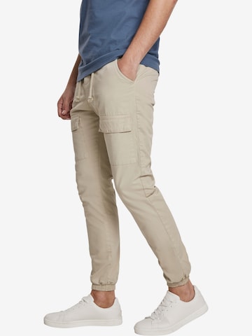 Effilé Pantalon cargo Urban Classics en beige