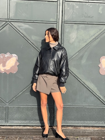 Leather Jacket And Skirt Look