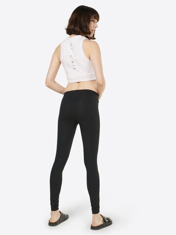 Skiny Skinny Leggings in Schwarz: Rückseite