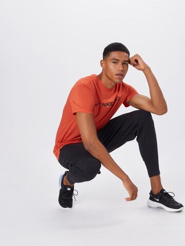 NIKE Regular fit Funkcionális felső 'Pro' - narancs