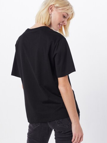 LACOSTE T-shirt i svart