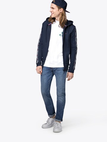 TOMMY HILFIGER - Sudadera con cremallera en azul