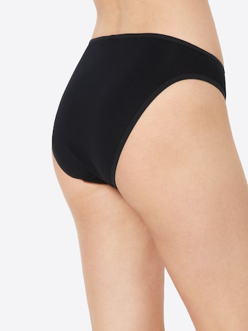 Slip Skiny en noir : derrière