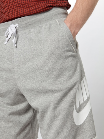 Nike Sportswear Štandardný strih Nohavice - Sivá