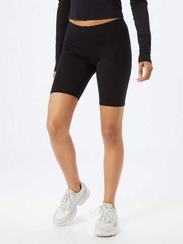 SISTERS POINT Skinny Leggings in Black: front