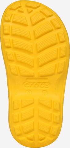 Crocs Kumisaappaat 'Handle It' värissä keltainen