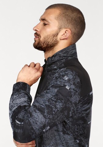 PUMA Sportjacke 'Energy Windbreaker' in Schwarz