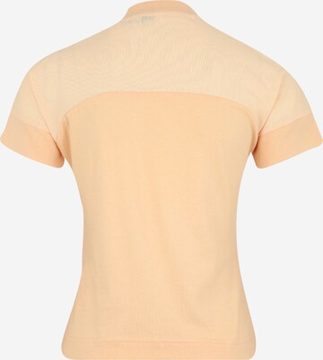 T-shirt fonctionnel ADIDAS SPORTSWEAR en orange : derrière