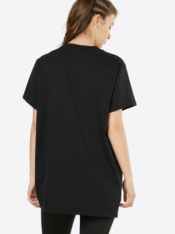 T-shirt ADIDAS ORIGINALS en noir : derrière