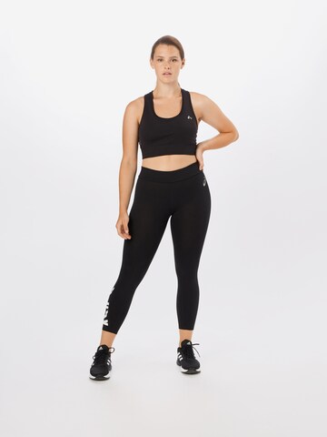 ASICS Skinny Sportbroek 'ESNT' in Zwart