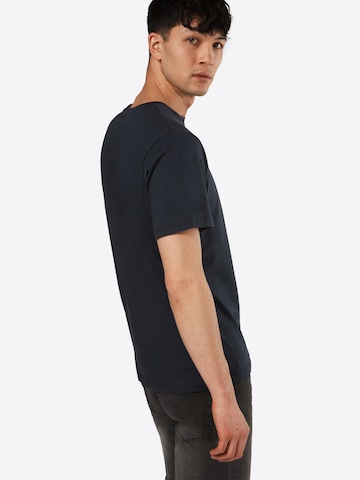 T-Shirt HELLY HANSEN en bleu : derrière