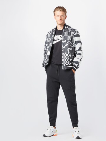 Nike SportswearTapered Hlače - crna boja