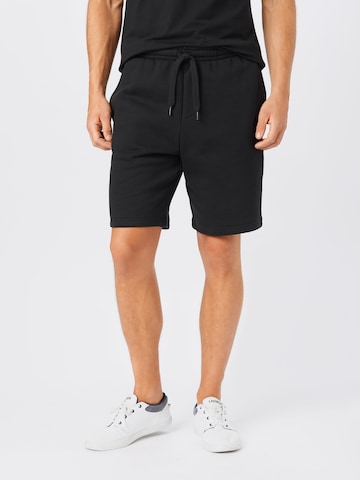 LACOSTE Regular Pants in Black: front