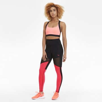 PUMA Skinny Sportbroek in Zwart