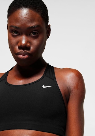 NIKE Regular Sports bra in Black