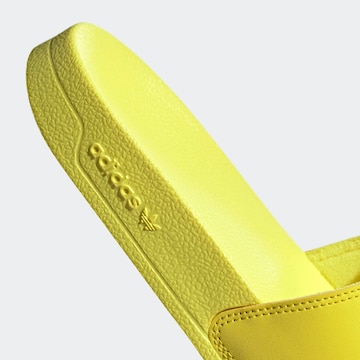 ADIDAS ORIGINALSNatikače s potpeticom 'Adilette' - žuta boja