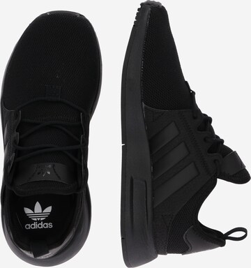 Baskets 'X_PLR' ADIDAS ORIGINALS en noir : sur le côté