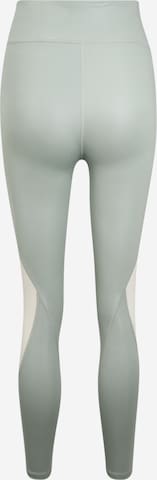 PUMA Skinny Sportbroek in Groen