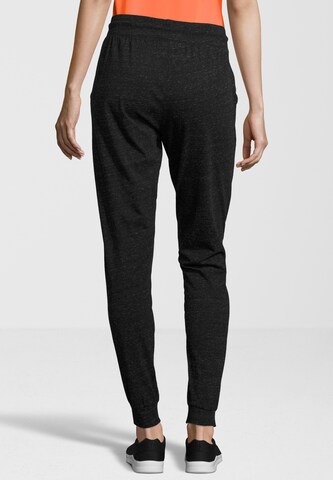 Athlecia Loosefit Sportbroek 'Clynen' in Zwart