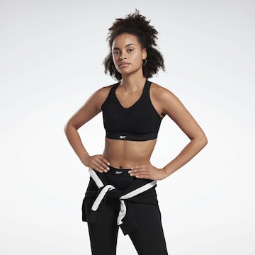 Reebok - Soutien Bustier Soutien de desporto em preto: frente