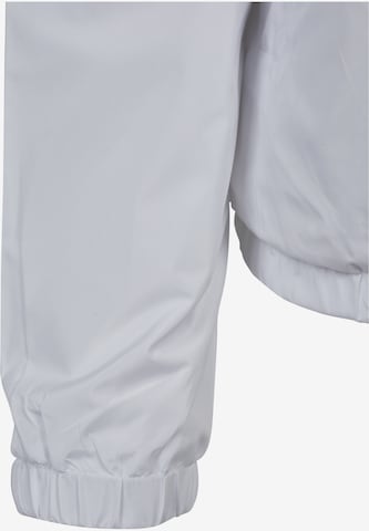 Veste mi-saison Urban Classics en blanc