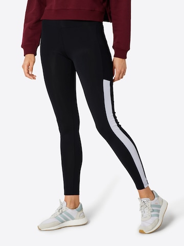 Urban Classics Skinny Leggings in Black: front