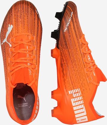 Chaussure de foot 'ULTRA 1.1' PUMA en orange