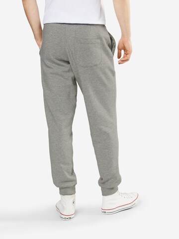 Tapered Pantaloni de la Urban Classics pe gri: spate