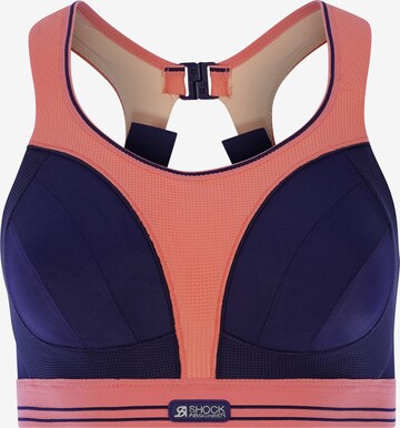 SHOCK ABSORBER Sports Bra in Orange: front