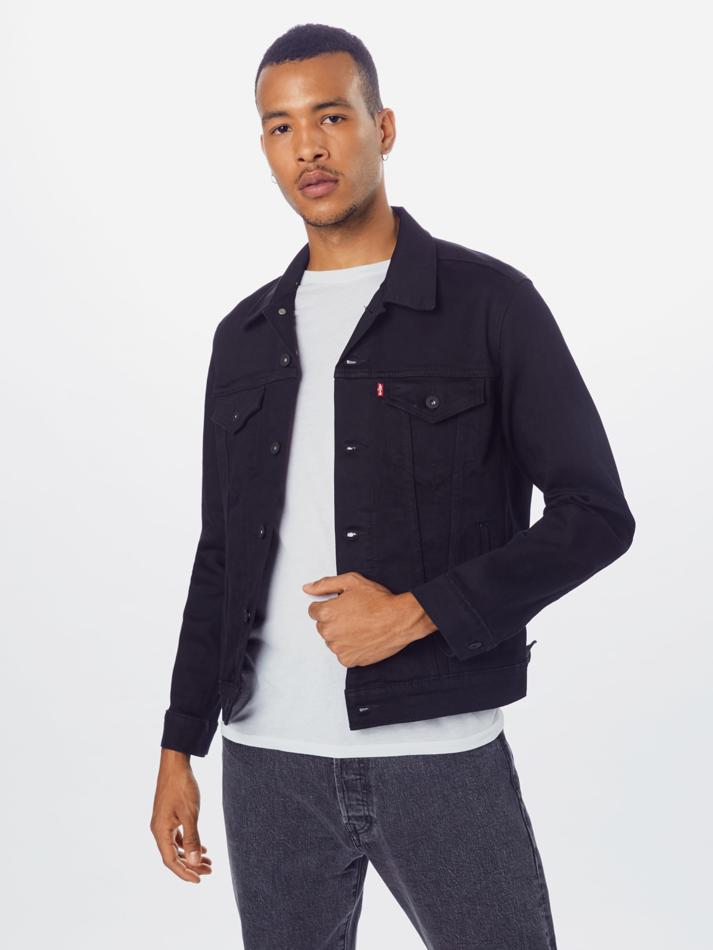 LEVI'S Between-season jacket 'THE TRUCKER' in Black | ABOUT YOU