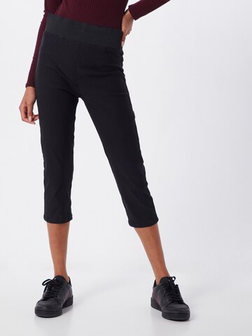 Skinny Pantaloni de la Freequent pe negru: față