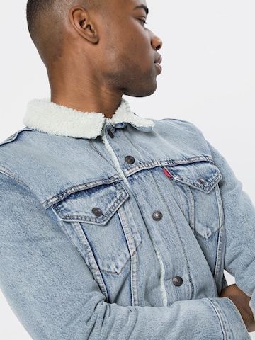 LEVI'S ® Between-Season Jacket 'Type 3 Sherpa Trucker' in Blue