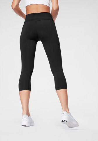 NIKE Skinny Sports trousers in Black
