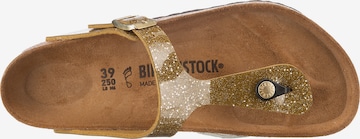 BIRKENSTOCK - Zapatos bajos 'Gizeh' en oro