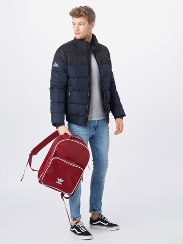 Coupe regular Veste d’hiver Superdry en bleu