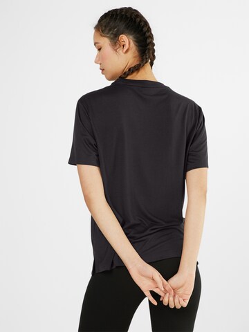PUMA Shirt in Black: back