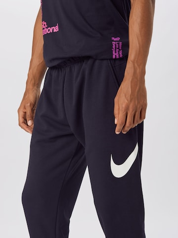 NIKE Tapered Sportbroek in Zwart