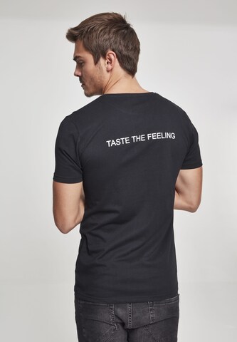 Mister Tee T-Shirt 'Coca Cola Taste The Feeling' in Schwarz