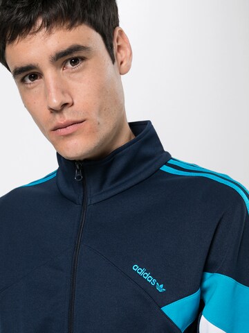 ADIDAS ORIGINALS Trainingsjacke 'Palmeston TT' in Blau