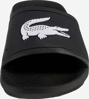 Saboți 'Croco Slide' de la LACOSTE pe negru